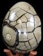 Septarian Dragon Egg Geode - Crystal Filled #40939-2